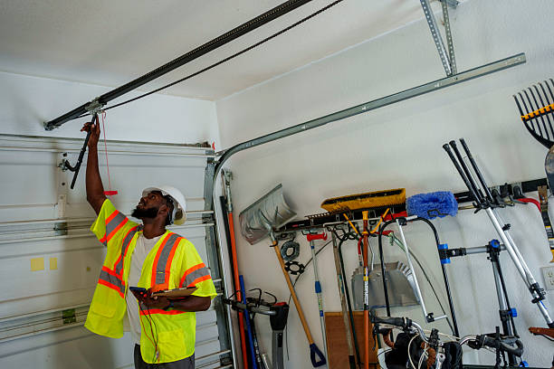 Professional Garage Door technician working in Plano, IL